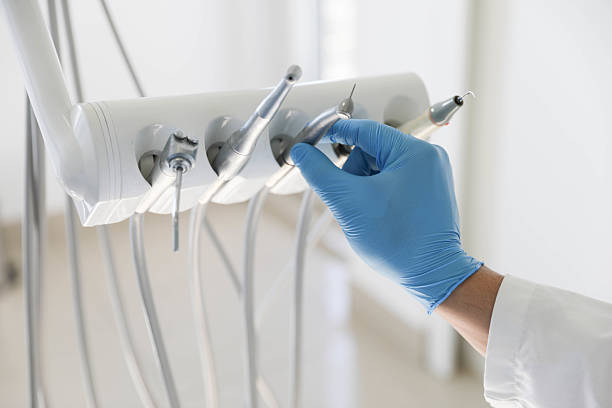 Professional Dental Veneers technician working in West Pensacola, FL